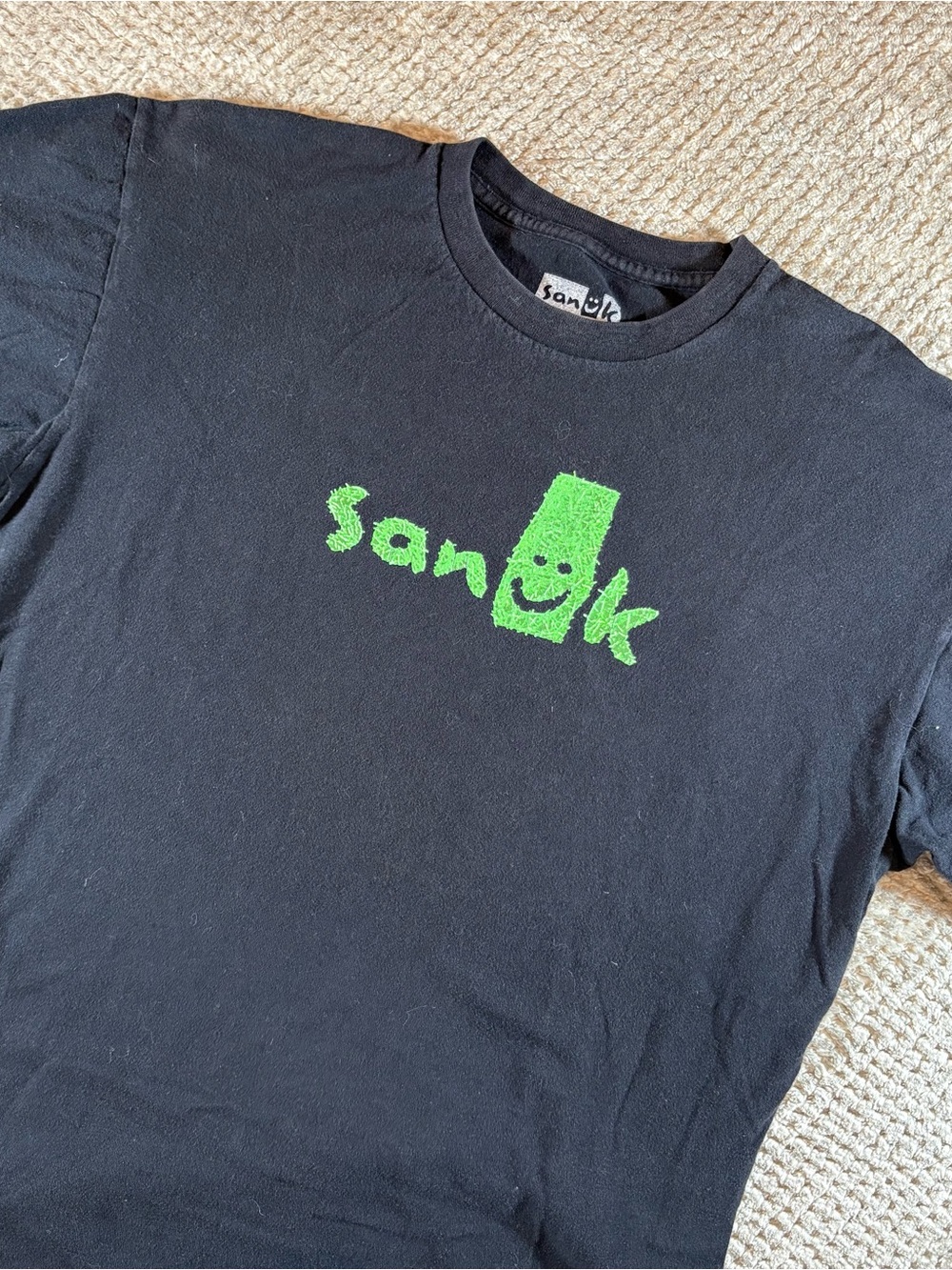 Sanuk Men’s L Black Tee with Neon Green Smiley Logo